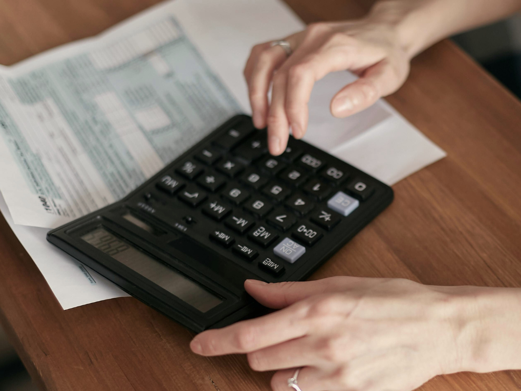 person using calculator